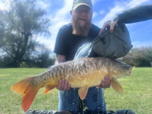 Fish and fisherman, Parkland Lake
